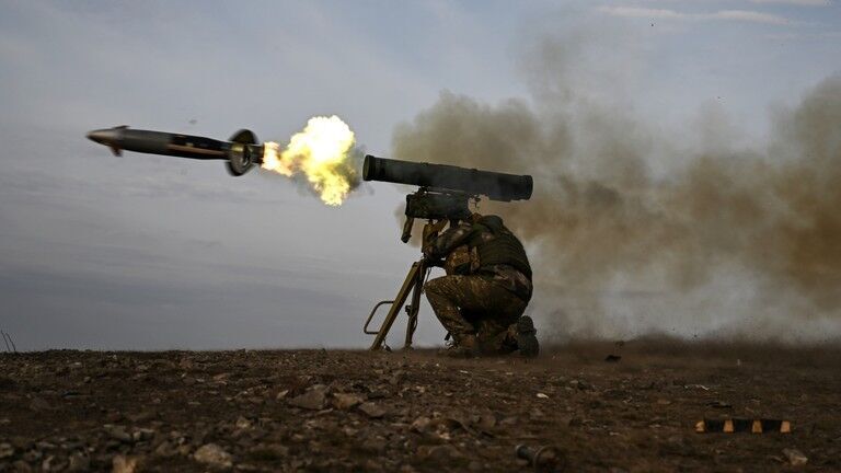 A Russian serviceman fires a Kornet anti-tank guided missile.