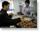 Click to enlarge Chinese consumers buying eggs