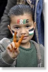 A child attends a protest against the Israeli bombardment