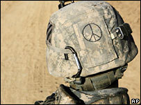 Click to enlarge soldier with peace sign