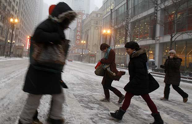 Pedestrians cross State Street in Chicago February 1, 2011.