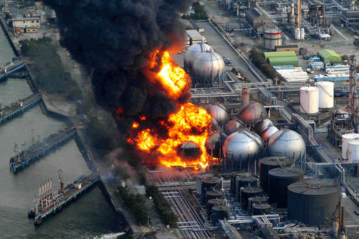 Click to enlarge Natural gas storage tanks burn