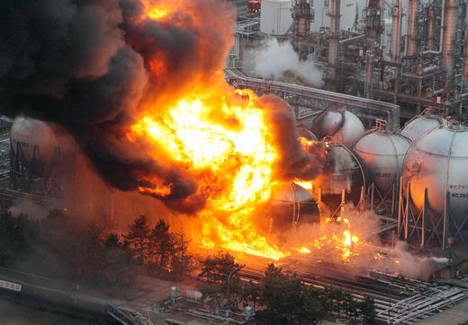 Click to enlarge Natural gas storage tanks burn