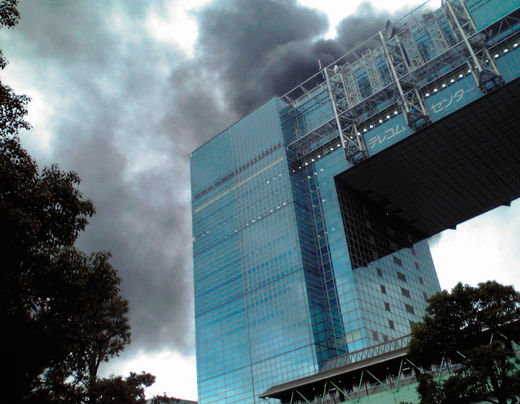 Click to enlarge A building burns