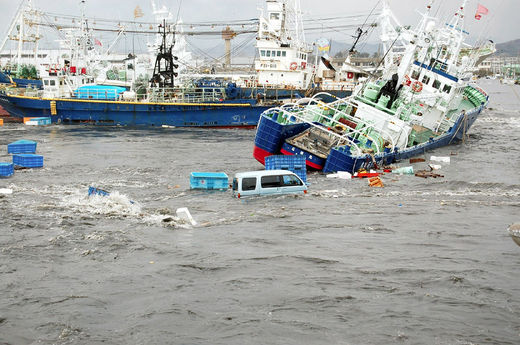 Click to enlarge Fishing boats and vehicles are carried