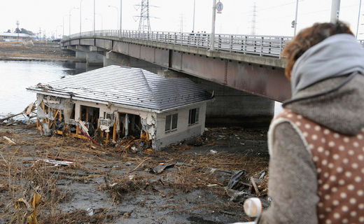 Click to enlarge A building swept under a bridge