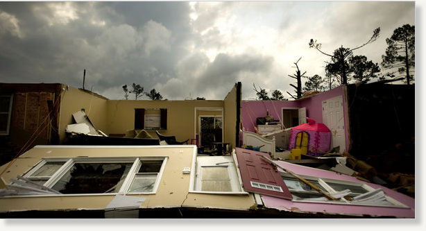 people running away from tornado. A tornado ripped apart a home