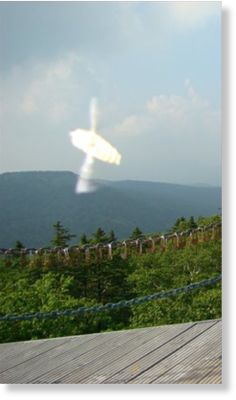 Click to enlarge UFO over Phoenix Mt., China