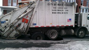   Sinkholes on Trash Truck Gets Stuck In Harrisburg  Pennsylvania Sinkhole