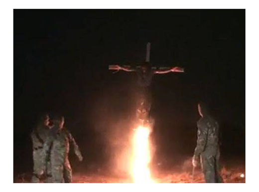 US-backed Azov battalion crucifies and burns man alive in Ukraine US-backed Azov battalion crucifies and burns man alive in Ukraine