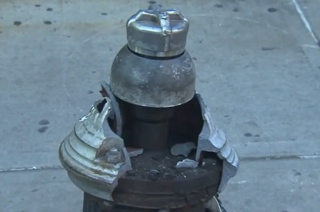 Click to enlarge NYC manhole explosion damages fire hydrant