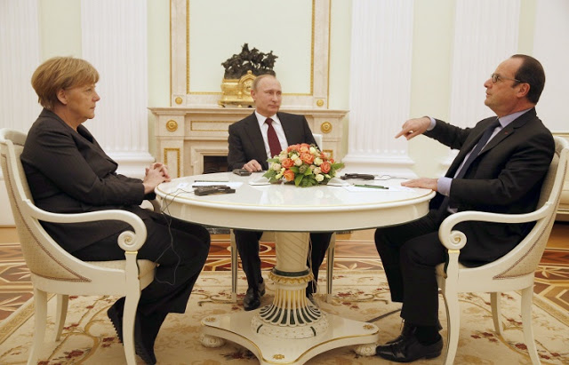 Click to enlarge holland merkel putin