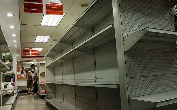 Click to enlarge empty store shelves