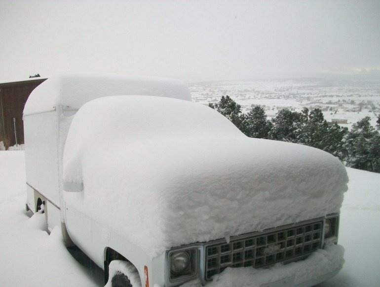 Snow covers truck