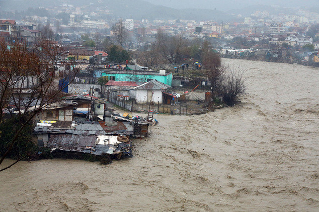 Flooded Lana river flows past homes in the Albanian capital Tirana