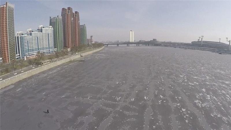 An aerial view of the frozen Taedong River in Pyongyang on Wednesday 