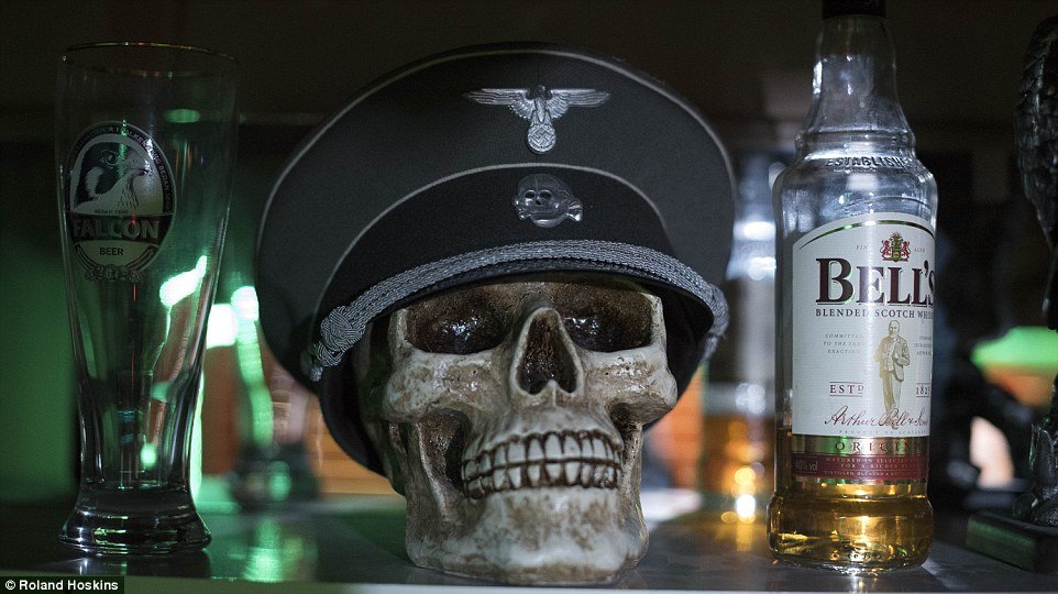 SS officer's hat on skull