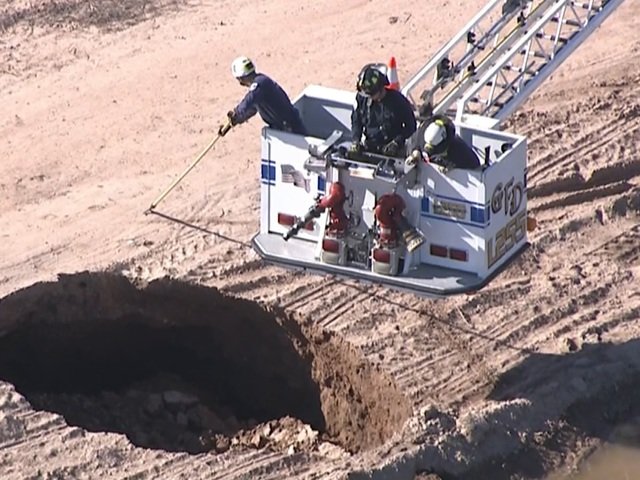  Rescue crews are on scene of a possible body recovery at a Queen Creek sinkhole.