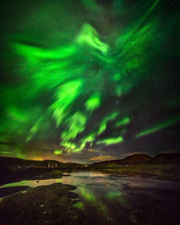 Click to enlarge phoenix forms in sky over Iceland