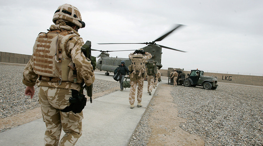 soldiers board helicopter