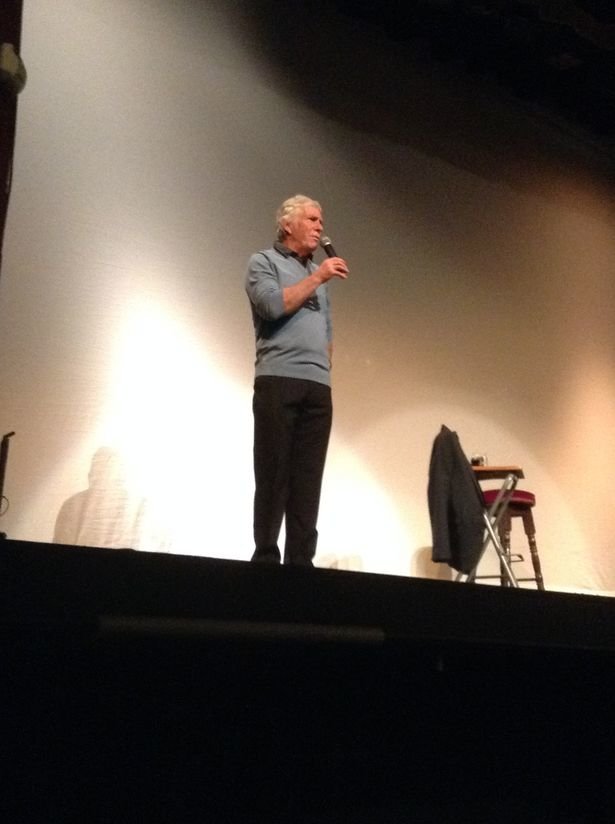 Click to enlarge Man on stage