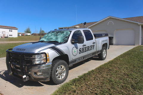 The windshield of a Dunn County Sheriff's truck was pelted with hail during a thunderstorm in Killdeer