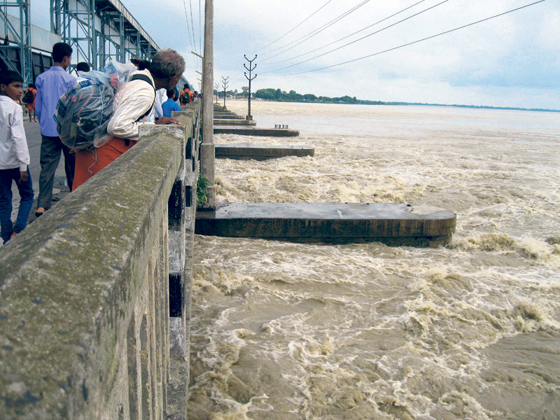 The swollen Saptakoshi River as seen from the Saptakoshi Dam in Sunsari district on Tuesday. The flow in the river reached 285,000 cusec (cubic foot per second), the highest so far this year, on Tuesday afternoon