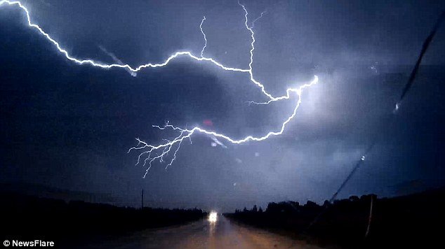 Impressive dashcam footage has emerged of cloud-to-ground lightning strikes in Manitoba, Canada
