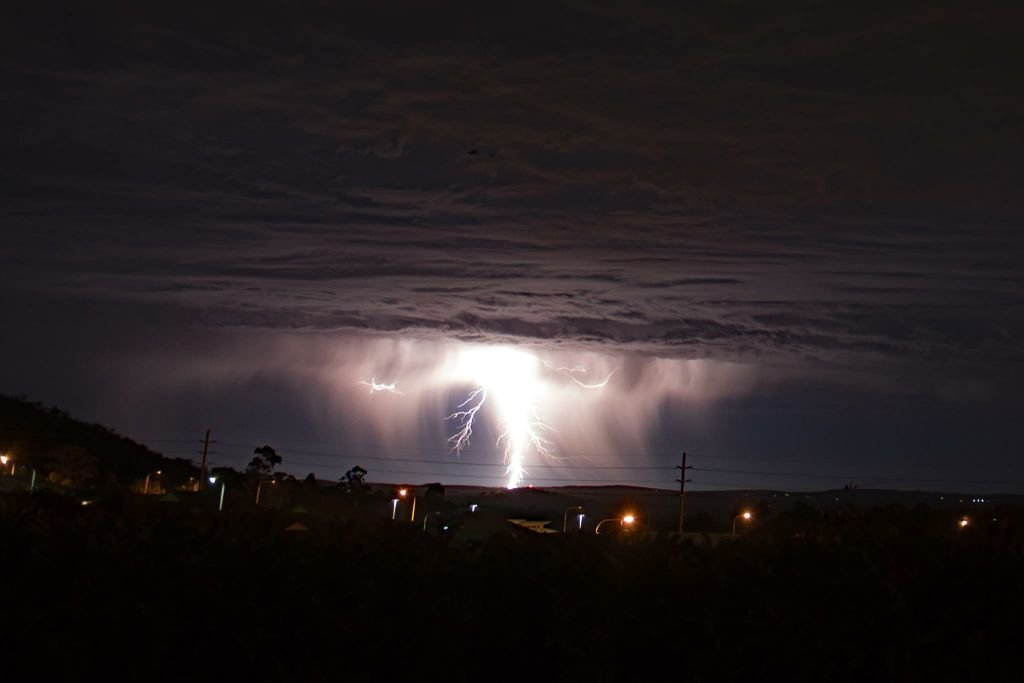 Garry Wilkinson captured the stunning moment a giant lightning bolt hit Toowoomba. 