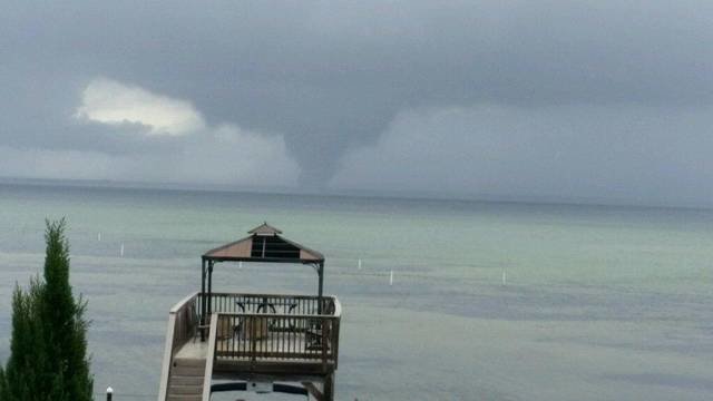 Click to enlarge A photo of a waterspout, taken by Mark Hinds