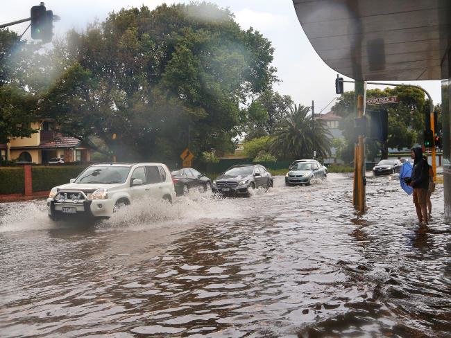 Heavy flooding on the corner of St Kilda and Grosvenor streets in Brighton.