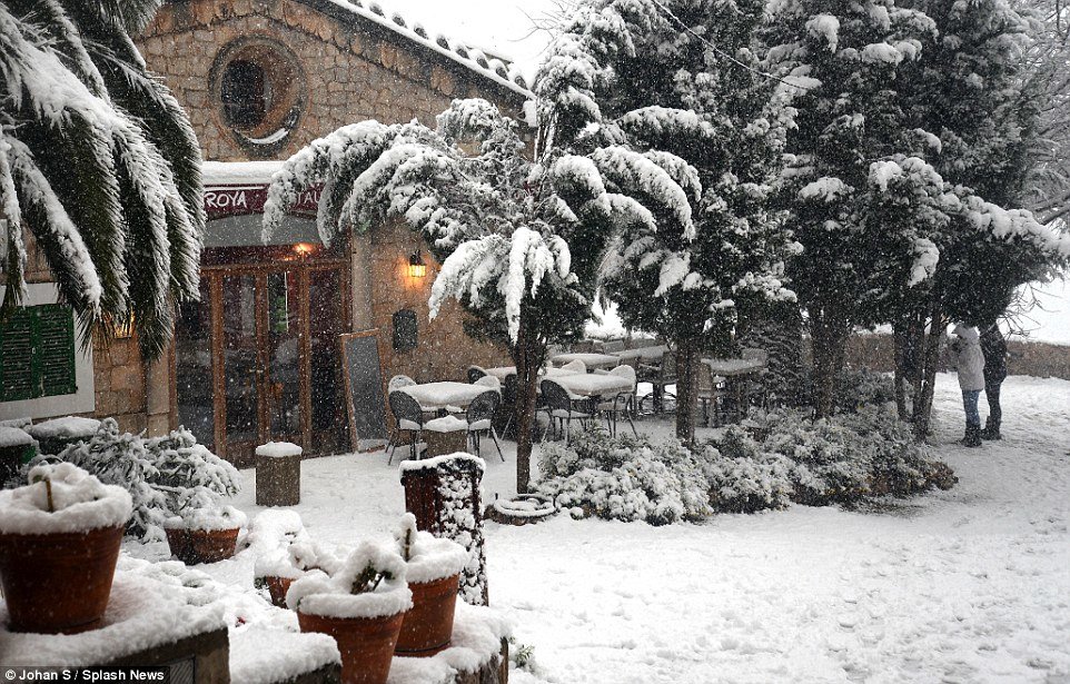 This restaurant in Valldemossa, a small village of Majorca, has been completely carpeted in snow  