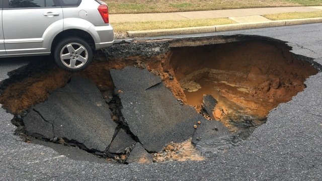 Sinkhole threatens to swallow car in Reading, Pennsylvania
