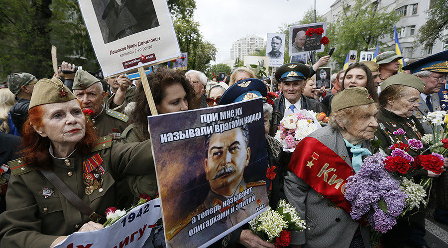 People take part in the Immortal Regiment march during the Victory Day celebrations in Kiev, Ukraine