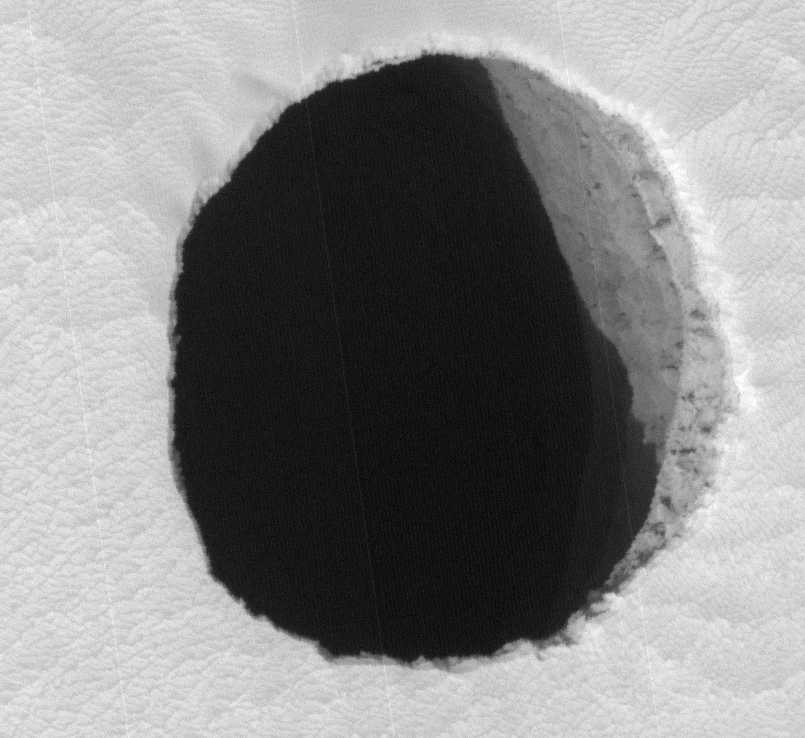 Click to enlarge Hole in Mars