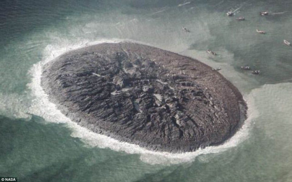 Satellite images of the mysterious island that rose up from the sea in 2013 week reveal that it is round, with cracks and remarkably flat, similar to a 'mud pie'