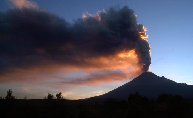 Popocatepetl Volcano spews smoke and ash