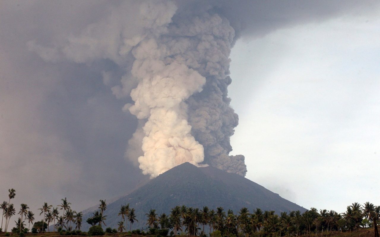 A view of the Mount Agung volcano erupting in Karangasem, Bali, on Monday