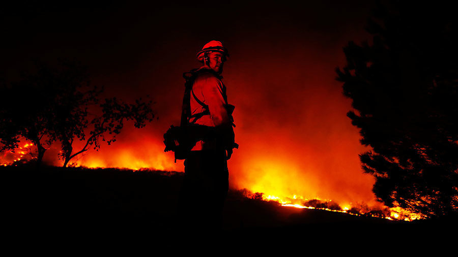 Lilac Fire, a fast moving wildfire, in Bonsall, California