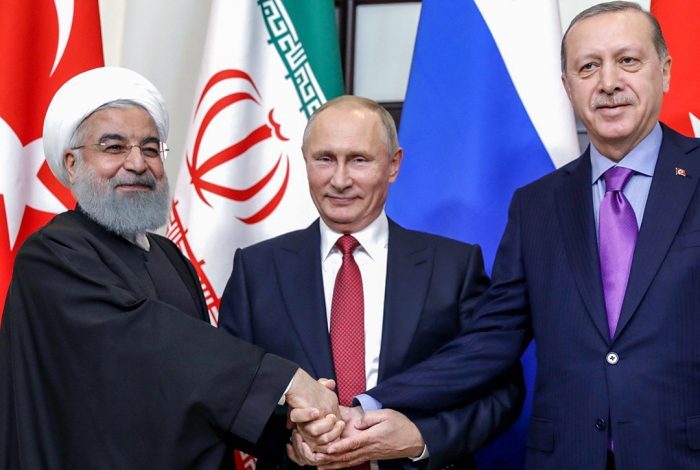 Peace talks between Iran, Russia and Turkey commence without input from US and amid scandal and regional instability.