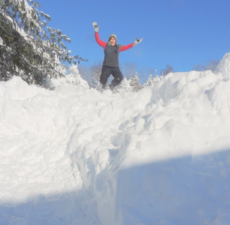 Caroyln Yerdon, the NWS observer in Redfield, climbed atop a 15-foot pile of snow on Wednesday to celebrate Redfield's (unofficial) record for the most snow to fall in Oswego County in 48 hours.