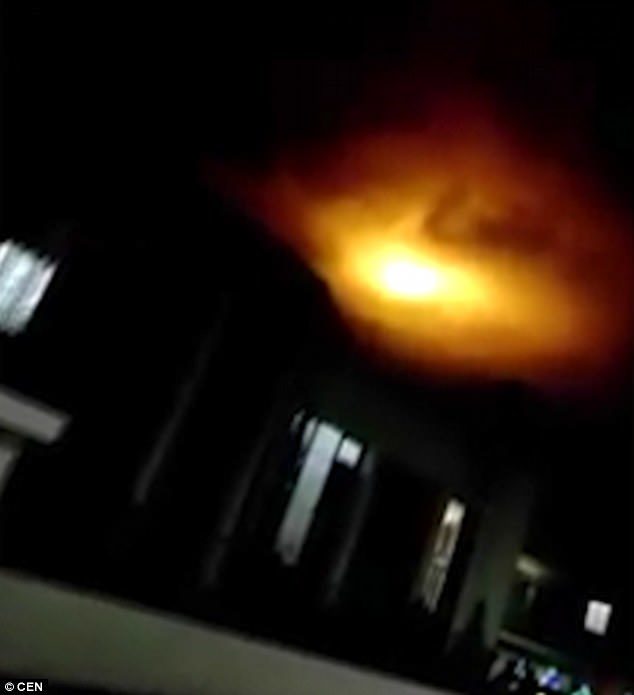 This is the moment a mysterious fireball (pictured) snaked its way across the night sky