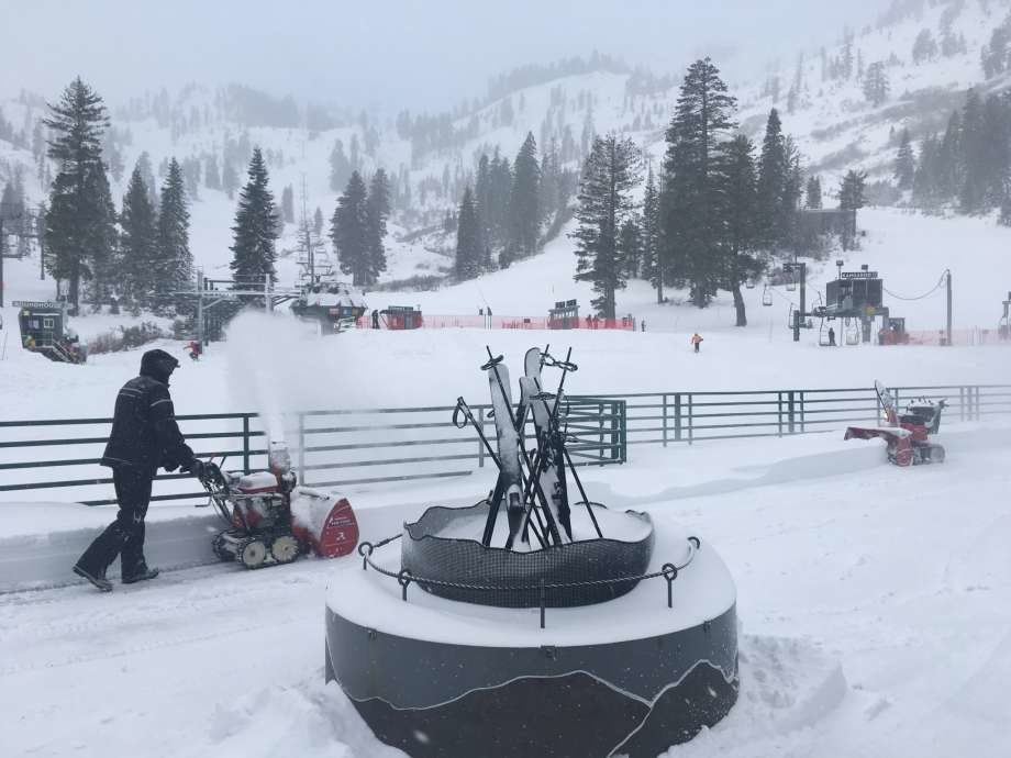 Employees dig out Alpine Meadows on January 25, 2018 after receiving over a foot of snow.