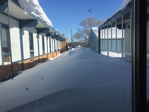 Snow as viewed from inside the school at Box Elder School,