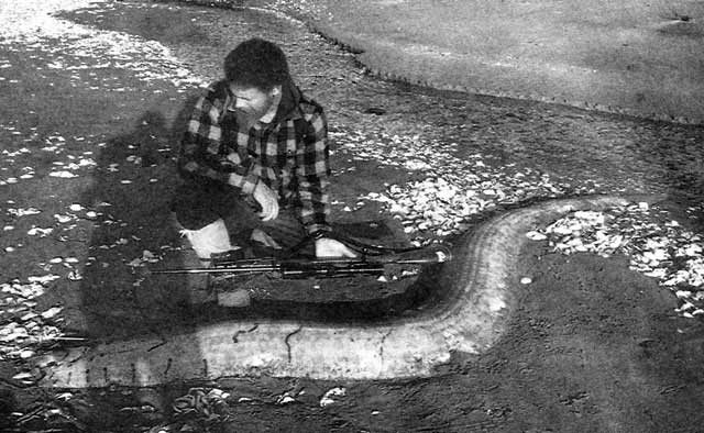 David Musgrave with the rare silvery oarfish found washed ashore at Masons Bay, Stewart Island.