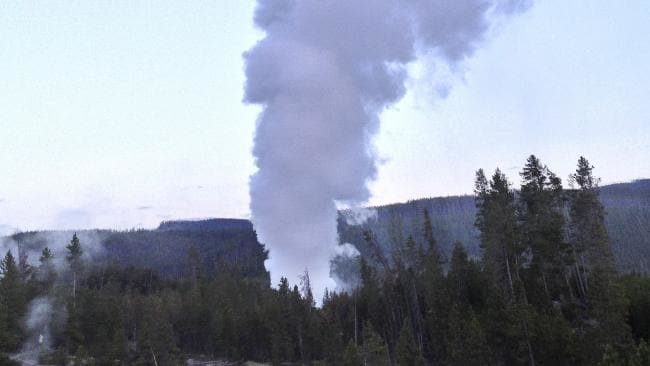 Steamboat Geyser, in Yellowstone National Park in Wyoming, erupts.