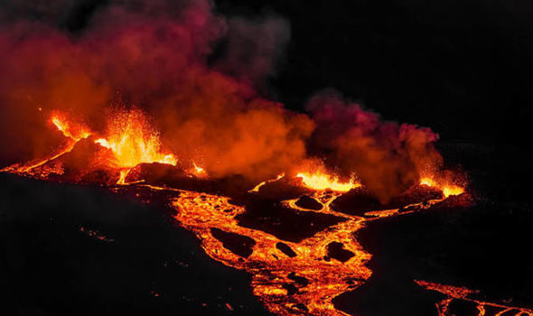Reunion volcano: Dramatic images show lava and steam spewing from the volcano