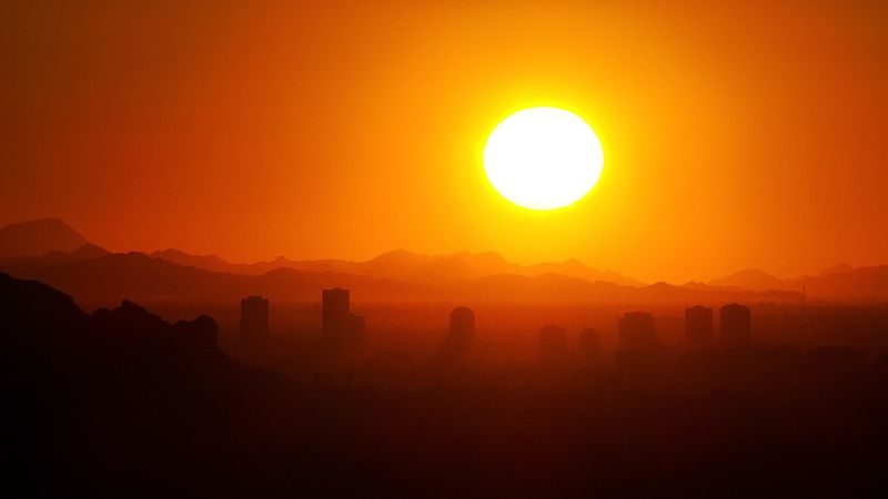 Temperatures in Phoenix have reached a new high, breaking a 70-year-old record. sun rise
