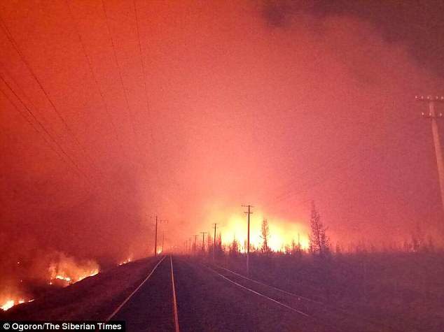 The track is in sprawling Amur region, an area in the far eastern part of Russia and is surrounded by fire