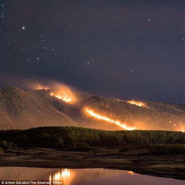 The blazing wildfire covers areas of Siberia, including the remote Baikal-Amur Mainline, an off-shoot of the Trans-Siberian railway